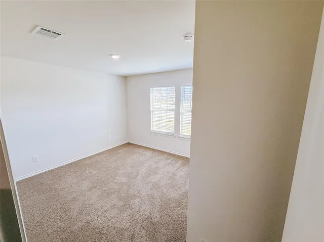 a view of empty room with window