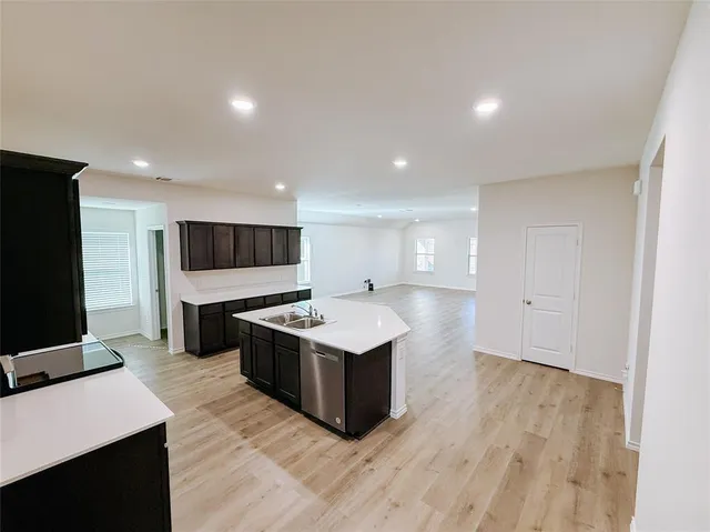 a living room with a flat screen tv furniture and a screen