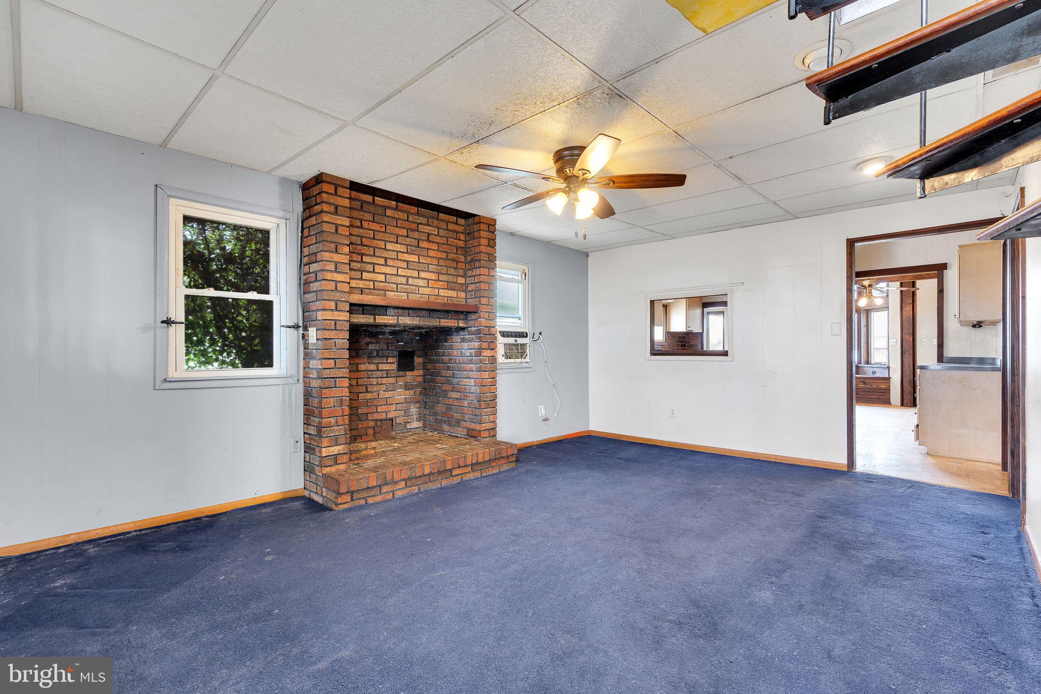 47 South Locust Avenue Salem, NJ 08079 - Photo 20 of 46 an empty room with windows and fireplace