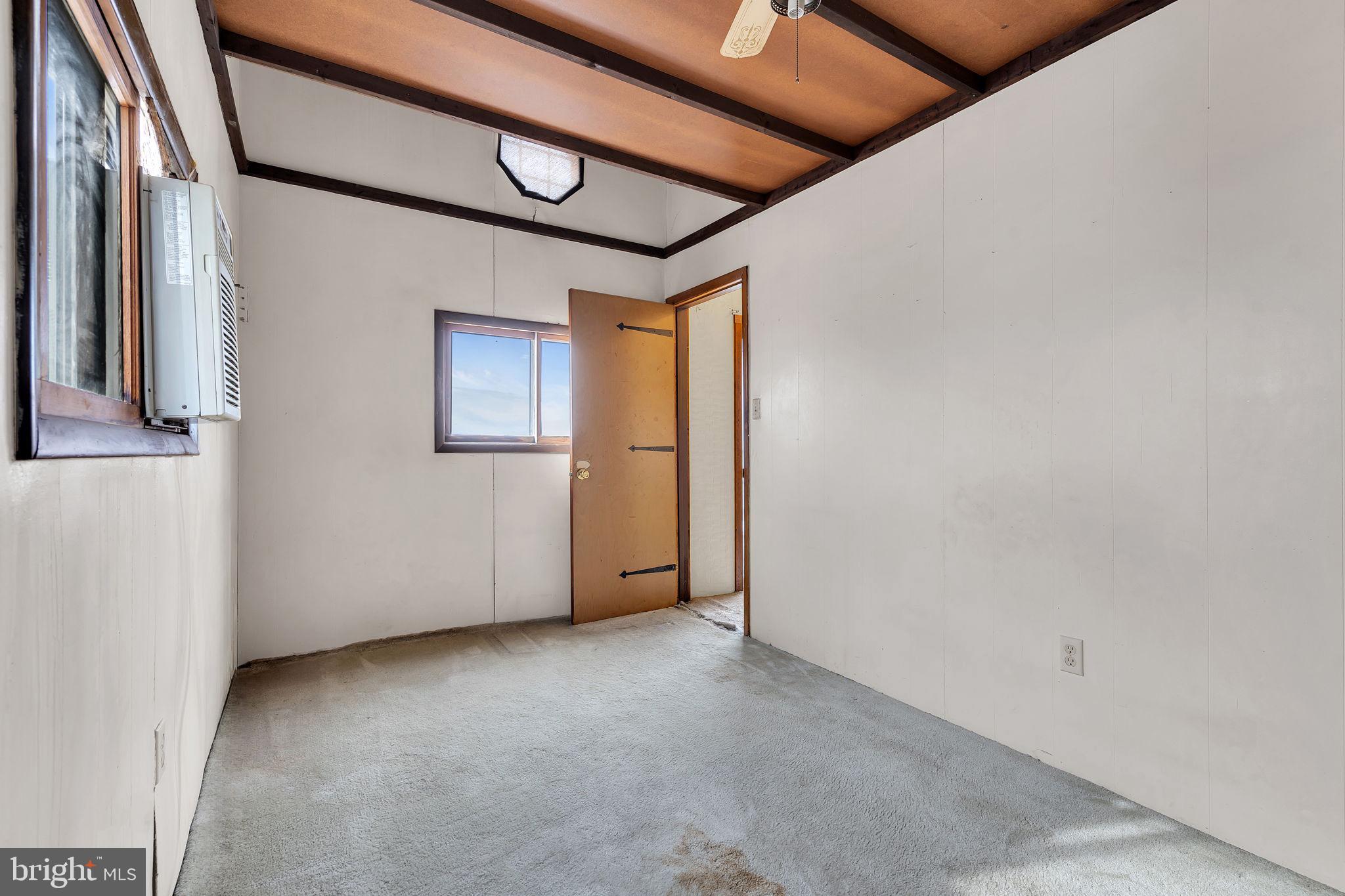 47 South Locust Avenue Salem, NJ 08079 - Photo 32 of 46 a view of an empty room with a window