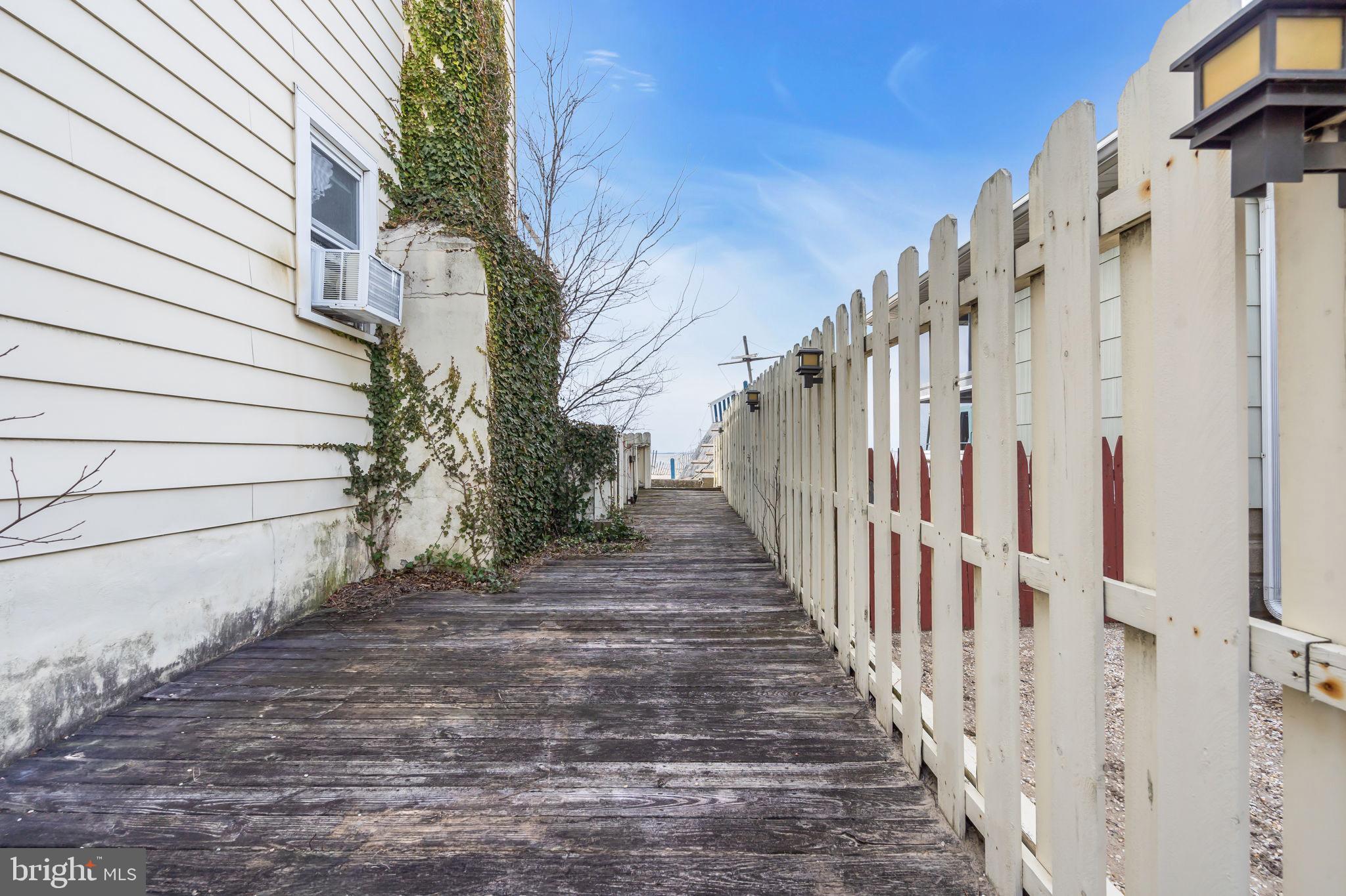 47 South Locust Avenue Salem, NJ 08079 - Photo 38 of 46 a view of a pathway with a white house