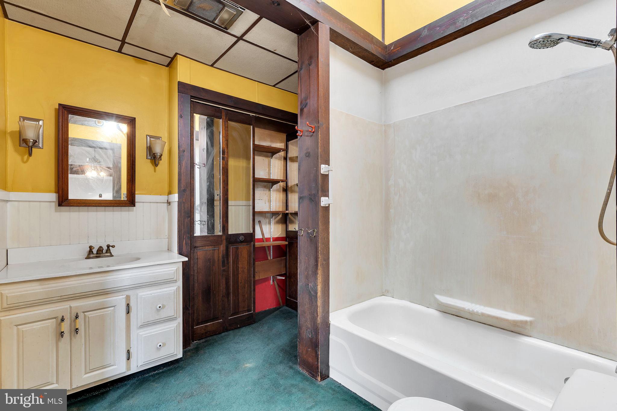 47 South Locust Avenue Salem, NJ 08079 - Photo 10 of 46 a spacious bathroom with a double vanity sink a mirror and a bathtub