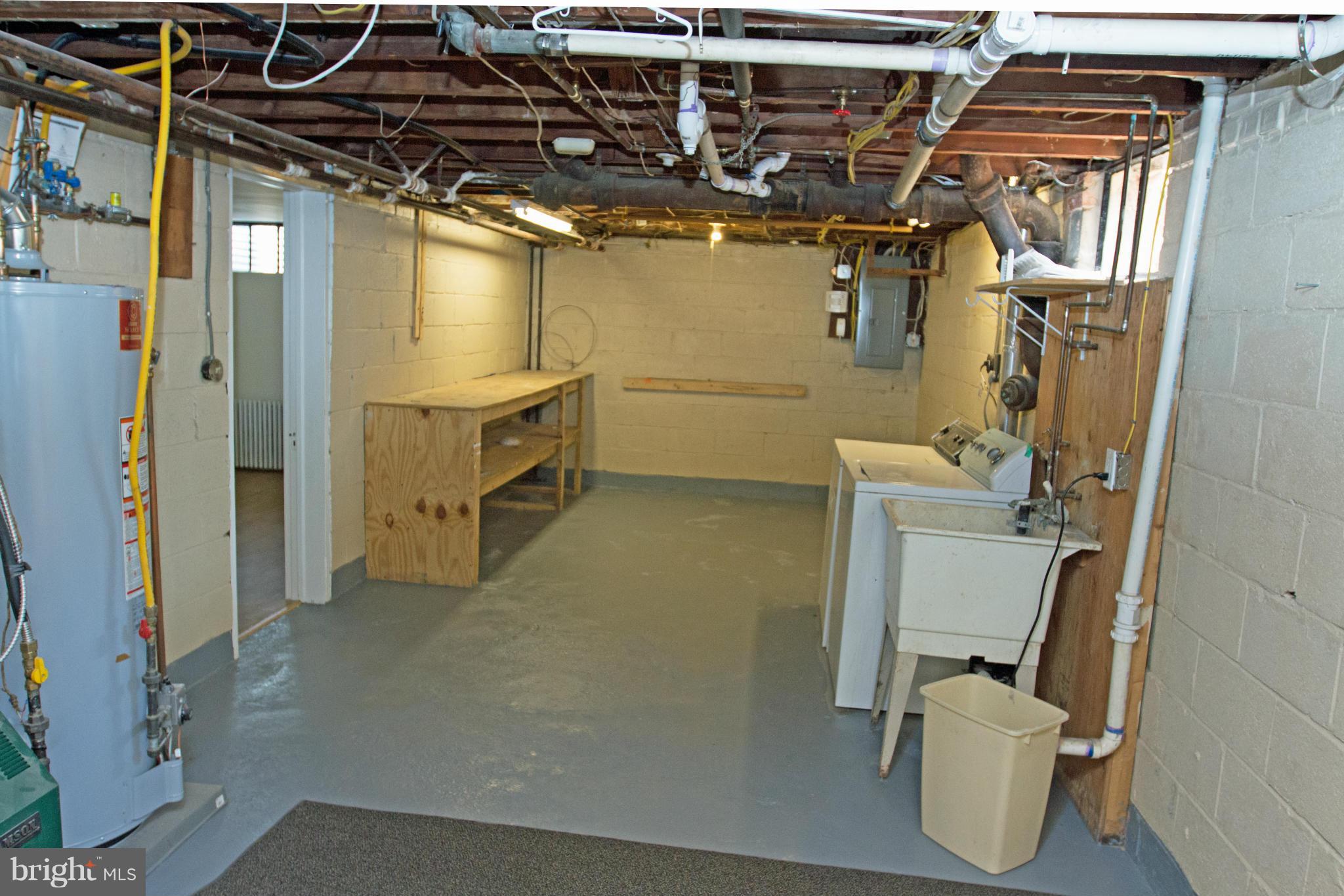 5303 Glen Falls Road Reisterstown, MD 21136 - Photo 16 of 30 a utility room with cabinets