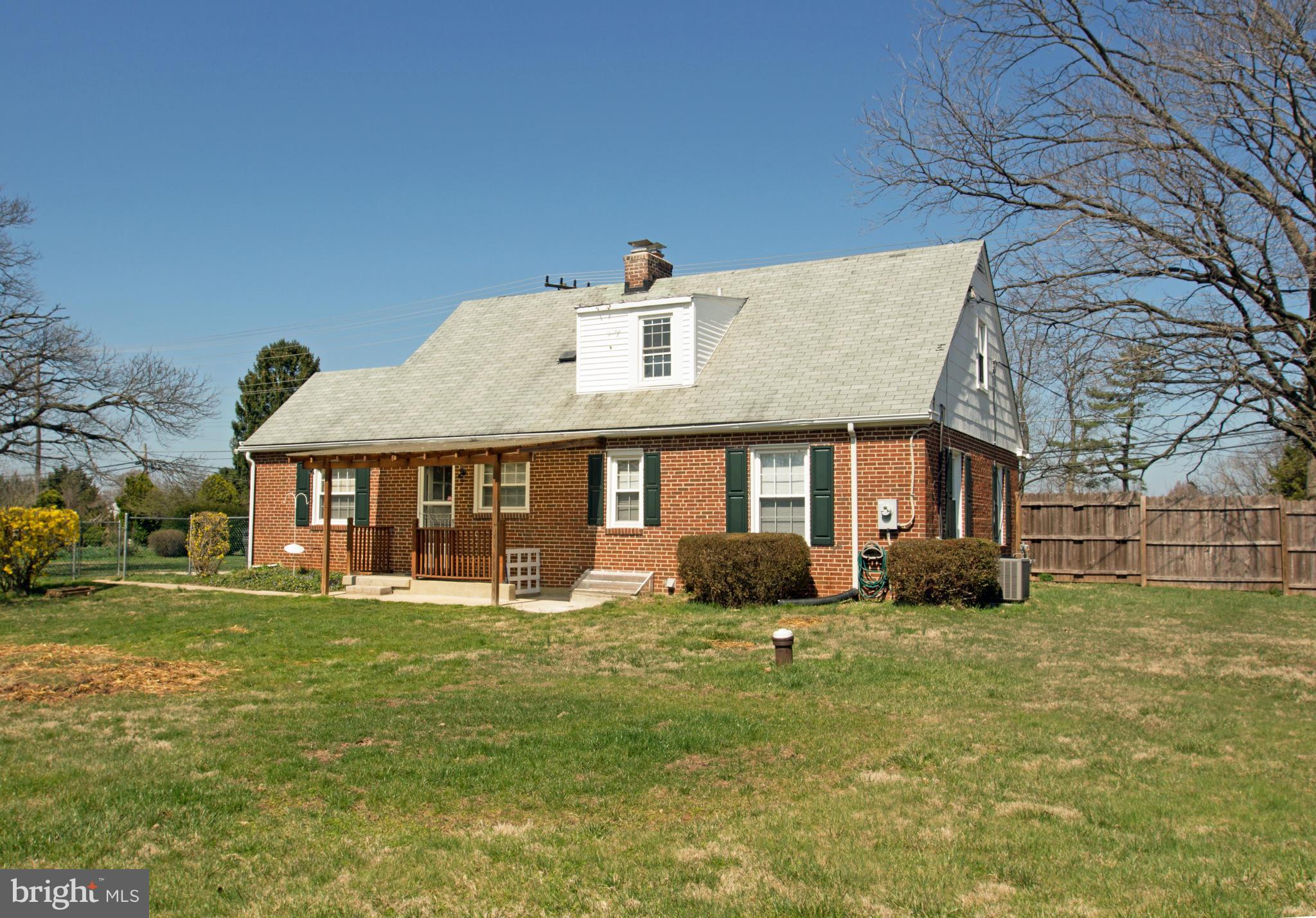 5303 Glen Falls Road Reisterstown, MD 21136 - Photo 24 of 30 a front view of a house with a yard