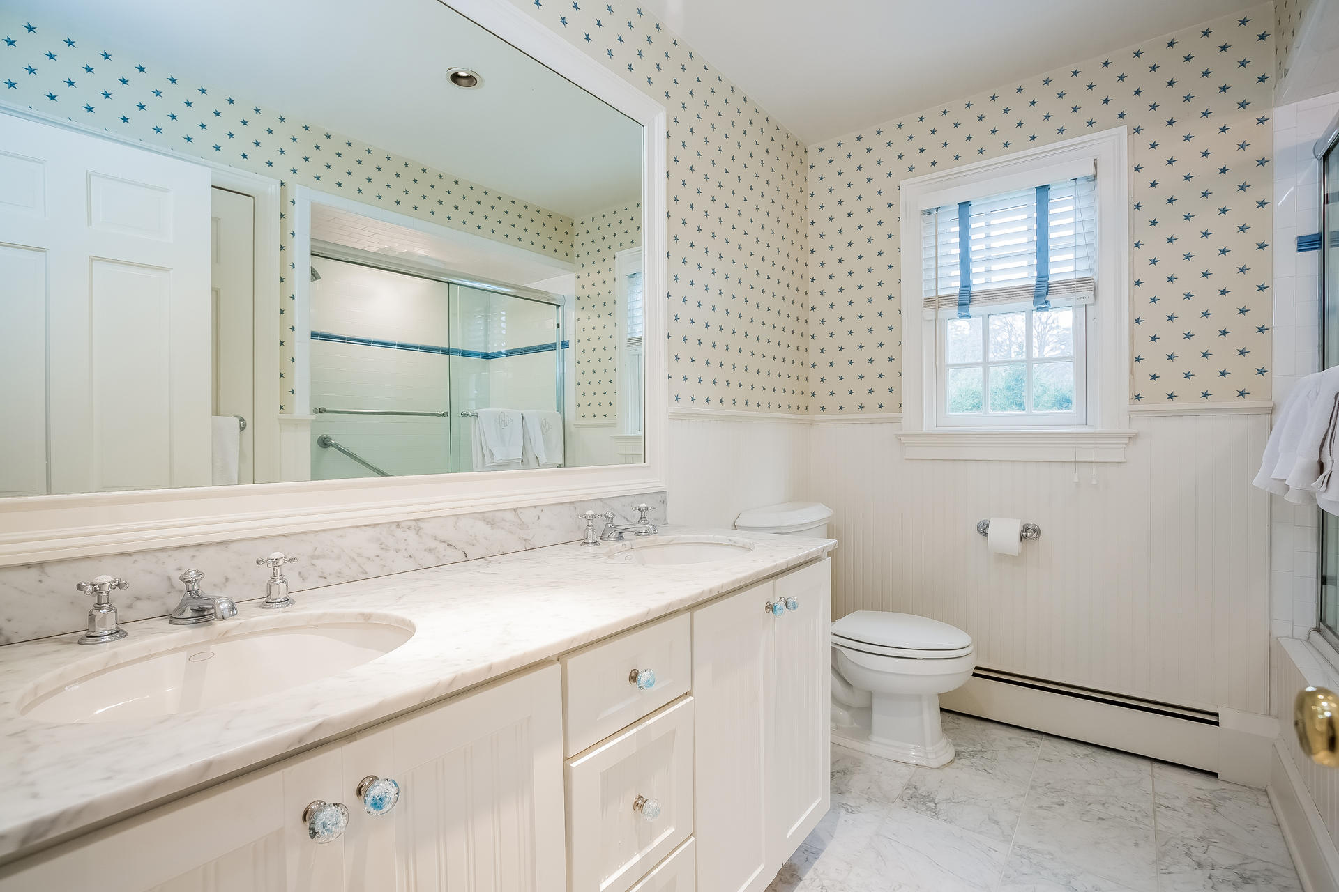 94 Marshall Ridge Road New Canaan, CT 06840 - Photo 23 of 50 a bathroom with a granite countertop sink toilet and mirror