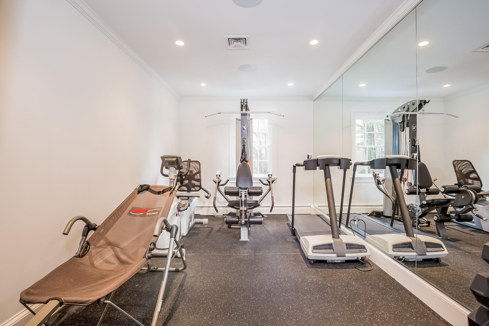 94 Marshall Ridge Road New Canaan, CT 06840 - Photo 28 of 50 a view of a room with gym equipment