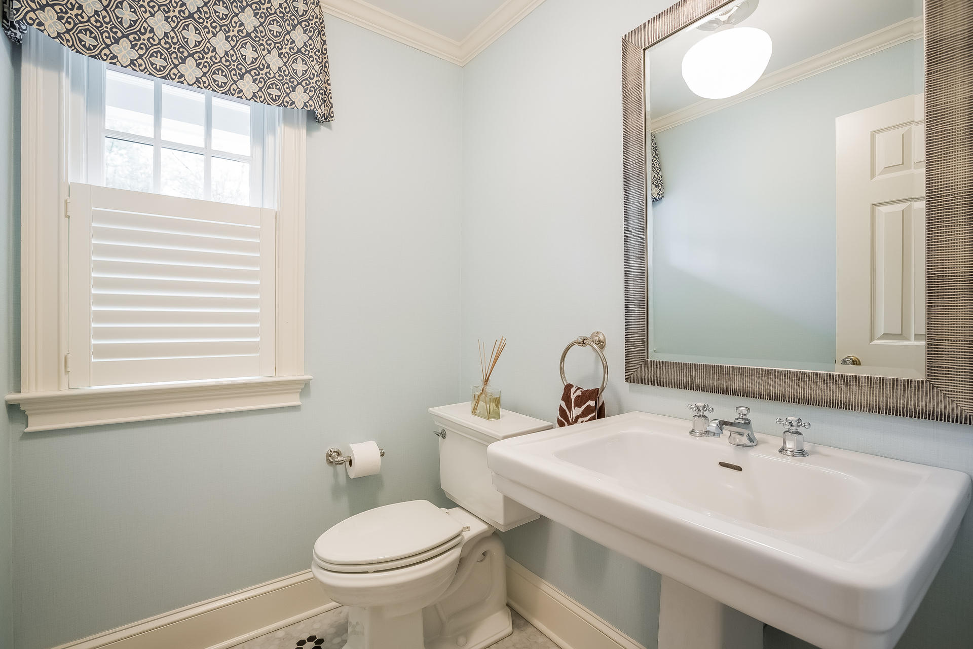 94 Marshall Ridge Road New Canaan, CT 06840 - Photo 33 of 50 a bathroom with a sink a toilet and a mirror