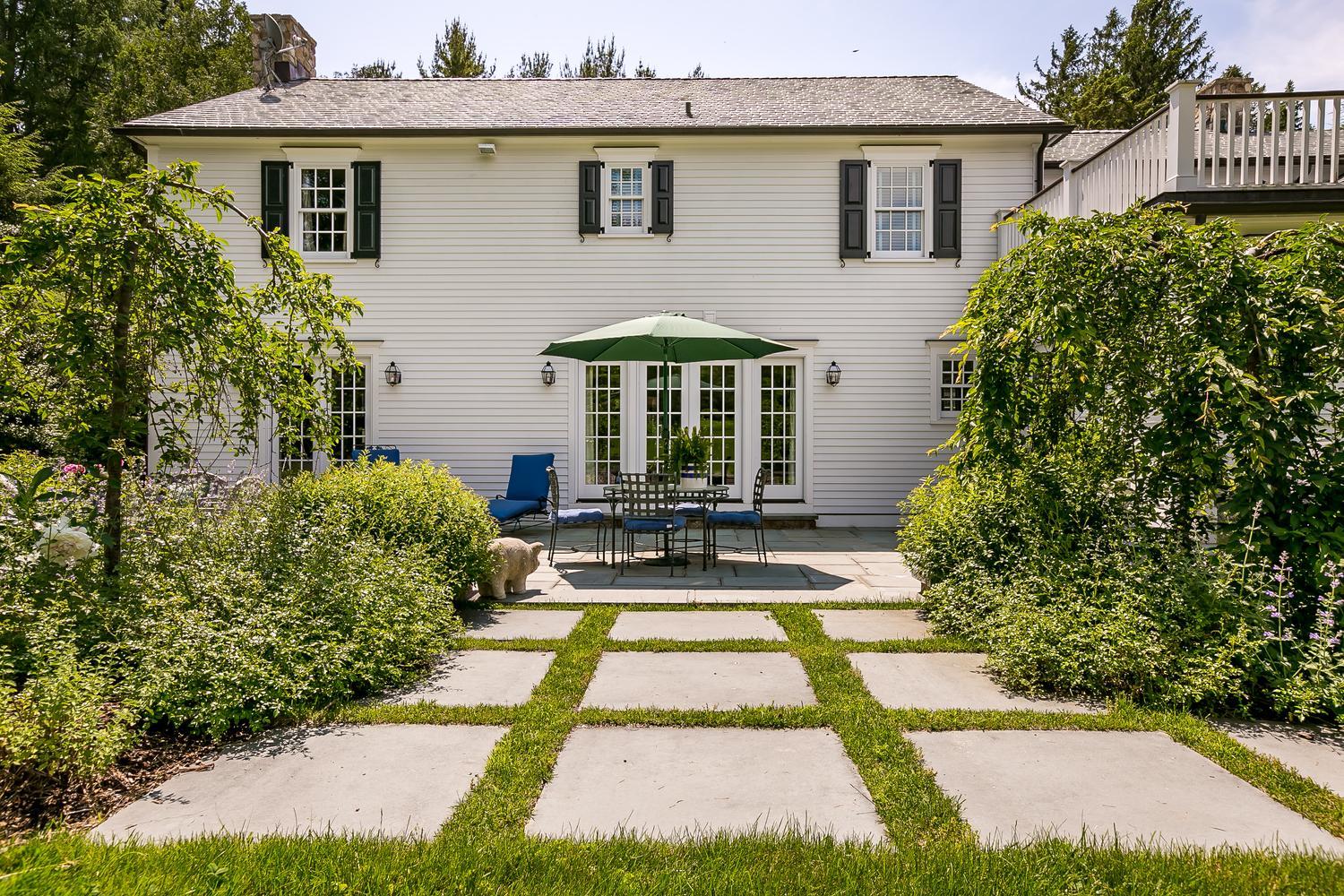 94 Marshall Ridge Road New Canaan, CT 06840 - Photo 39 of 50 a house view with a garden space