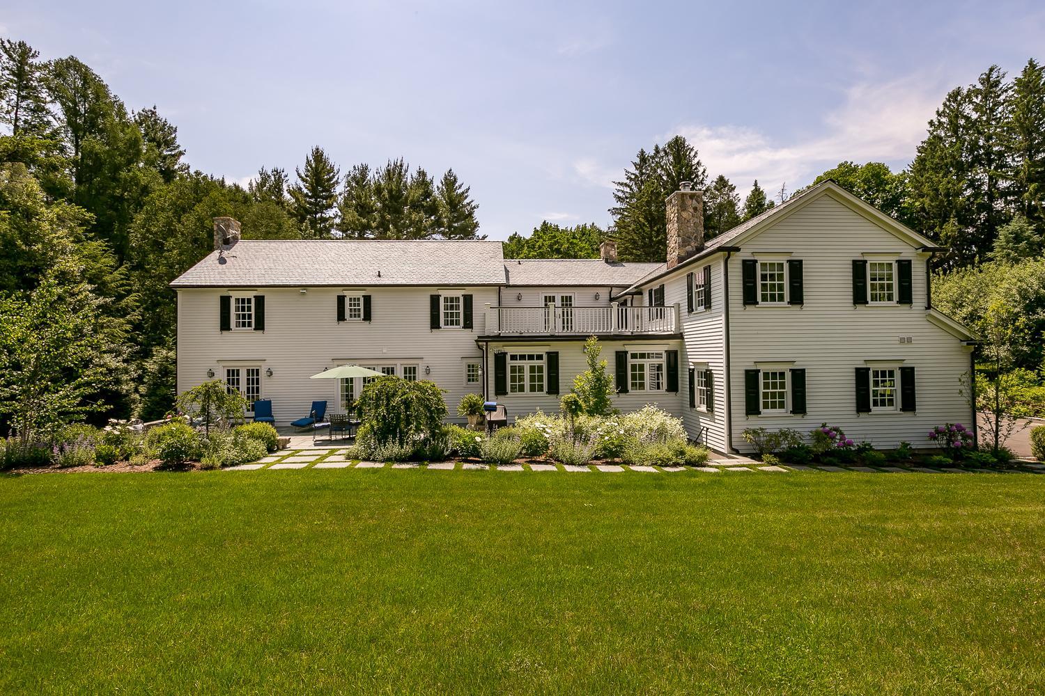 94 Marshall Ridge Road New Canaan, CT 06840 - Photo 49 of 50 a front view of house with yard and green space