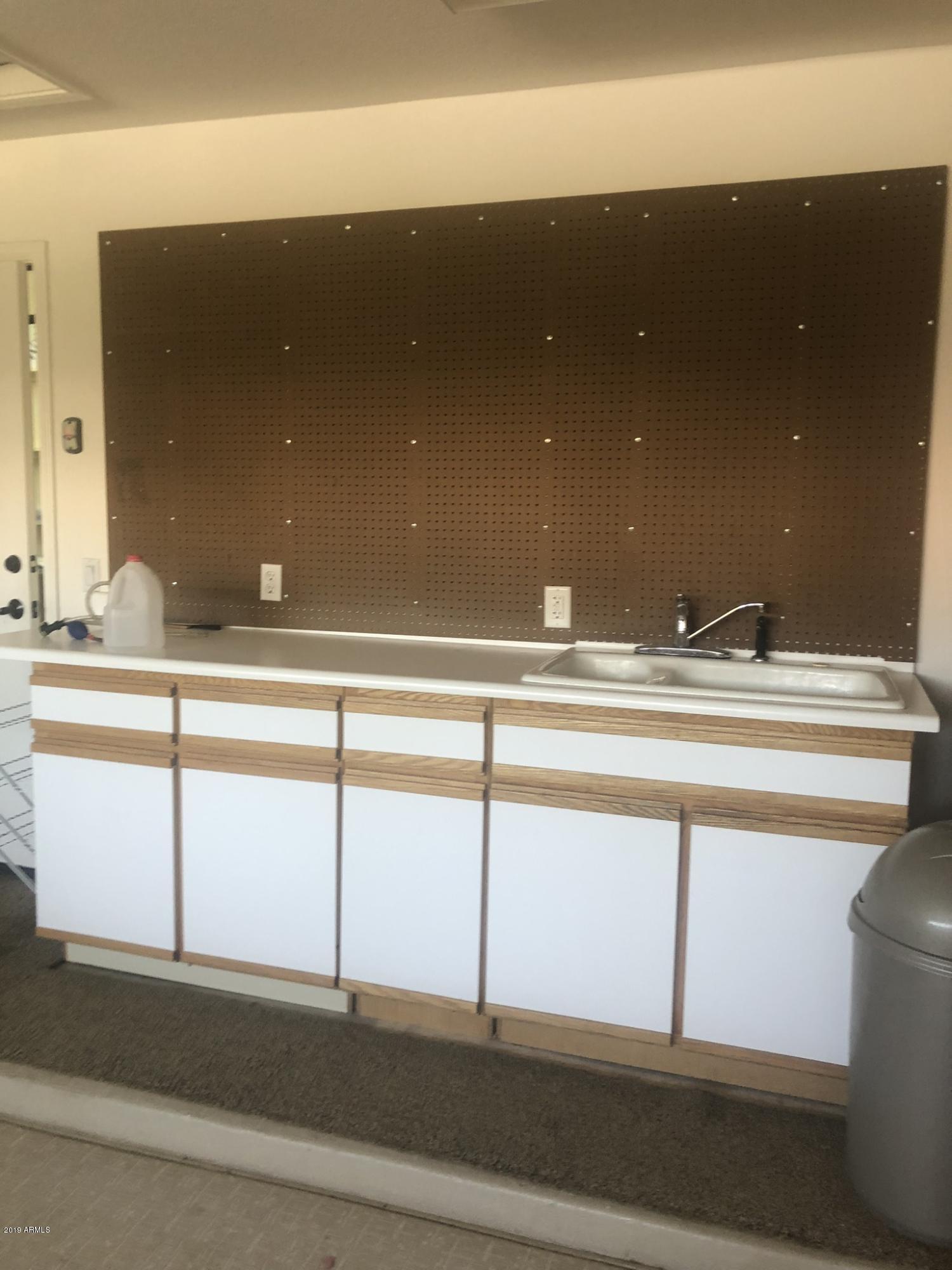 3923 North 151st Avenue Goodyear, AZ 85395 - Photo 19 of 22 a view of a glass door