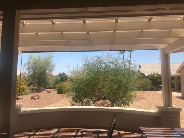 a view of a window and bench in the window