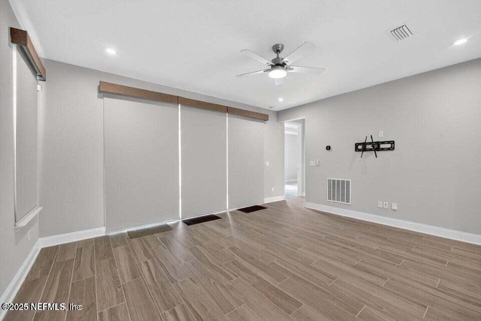 97 Kellet Way St. Johns, FL 32259 - Photo 12 of 23 wooden floor in an empty room with a window