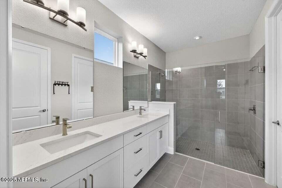 97 Kellet Way St. Johns, FL 32259 - Photo 19 of 23 a bathroom with a double vanity sink mirror double and shower