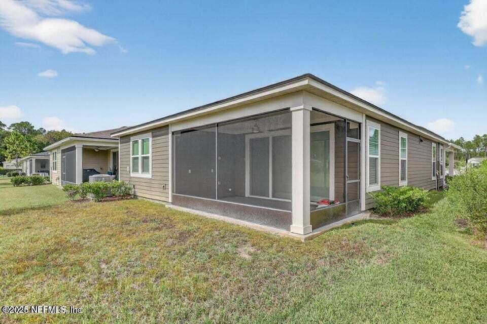 97 Kellet Way St. Johns, FL 32259 - Photo 20 of 23 a view of a house with backyard