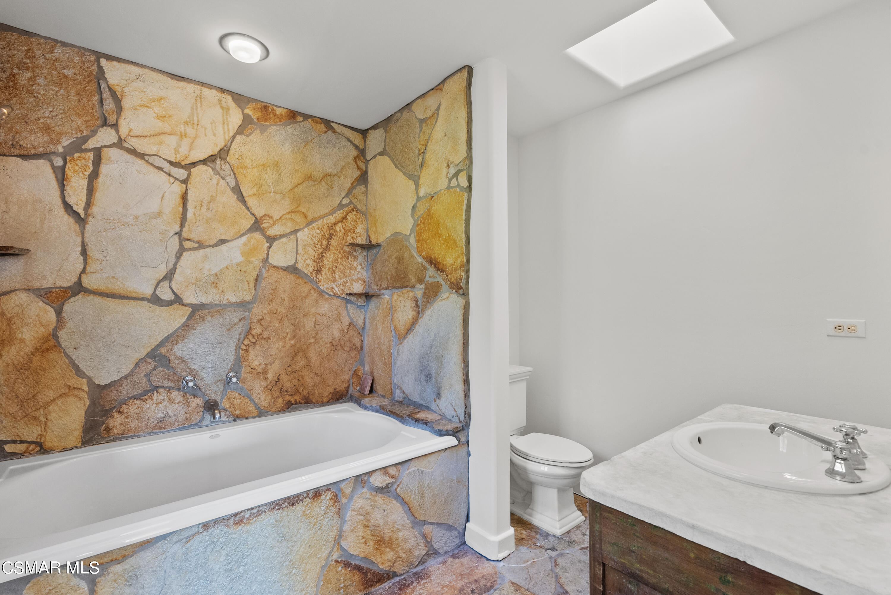 2045 Lookout Drive Agoura Hills, CA 91301 - Photo 19 of 34 a bathroom with a sink and a toilet