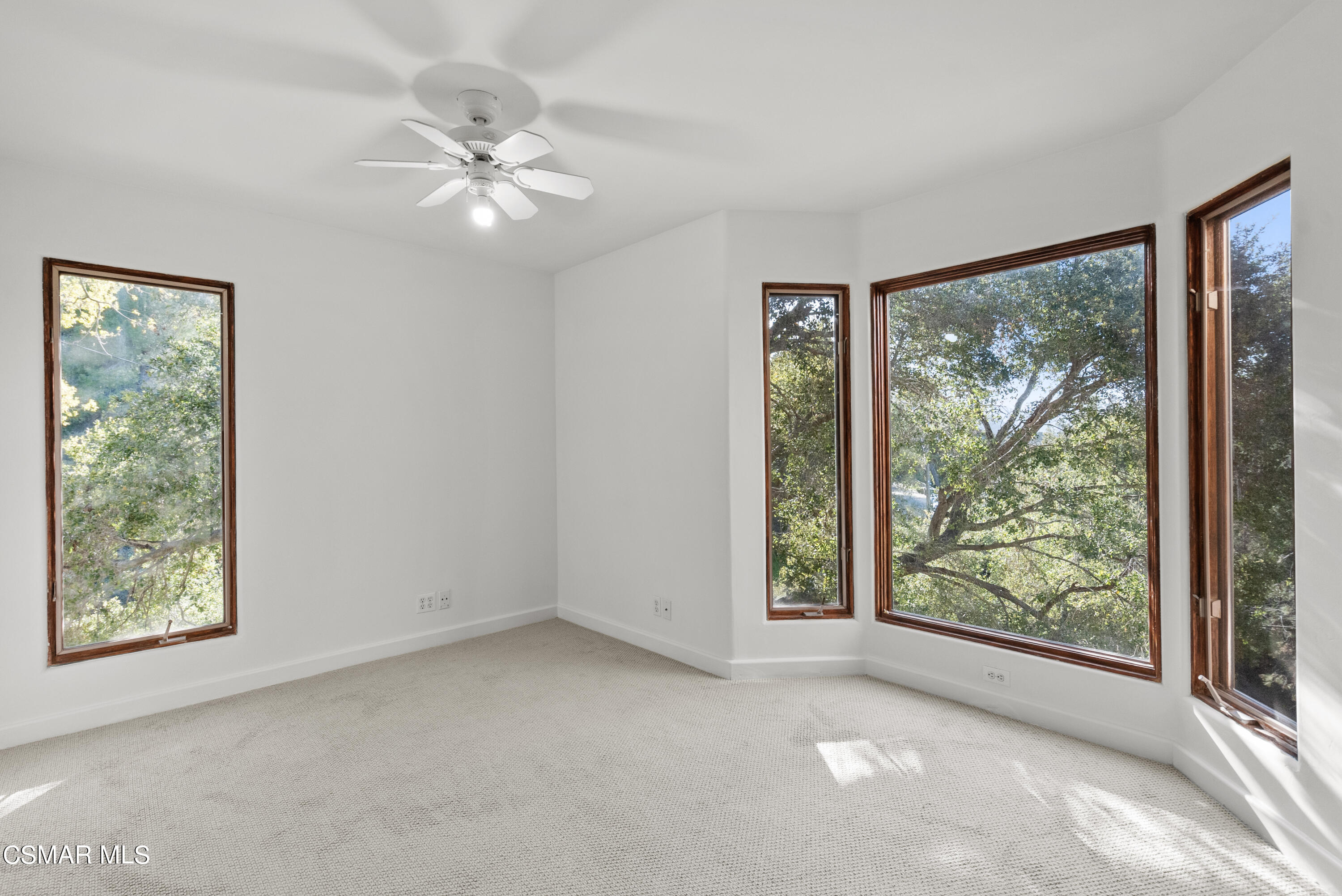 2045 Lookout Drive Agoura Hills, CA 91301 - Photo 20 of 34 wooden floor in an empty room with a window