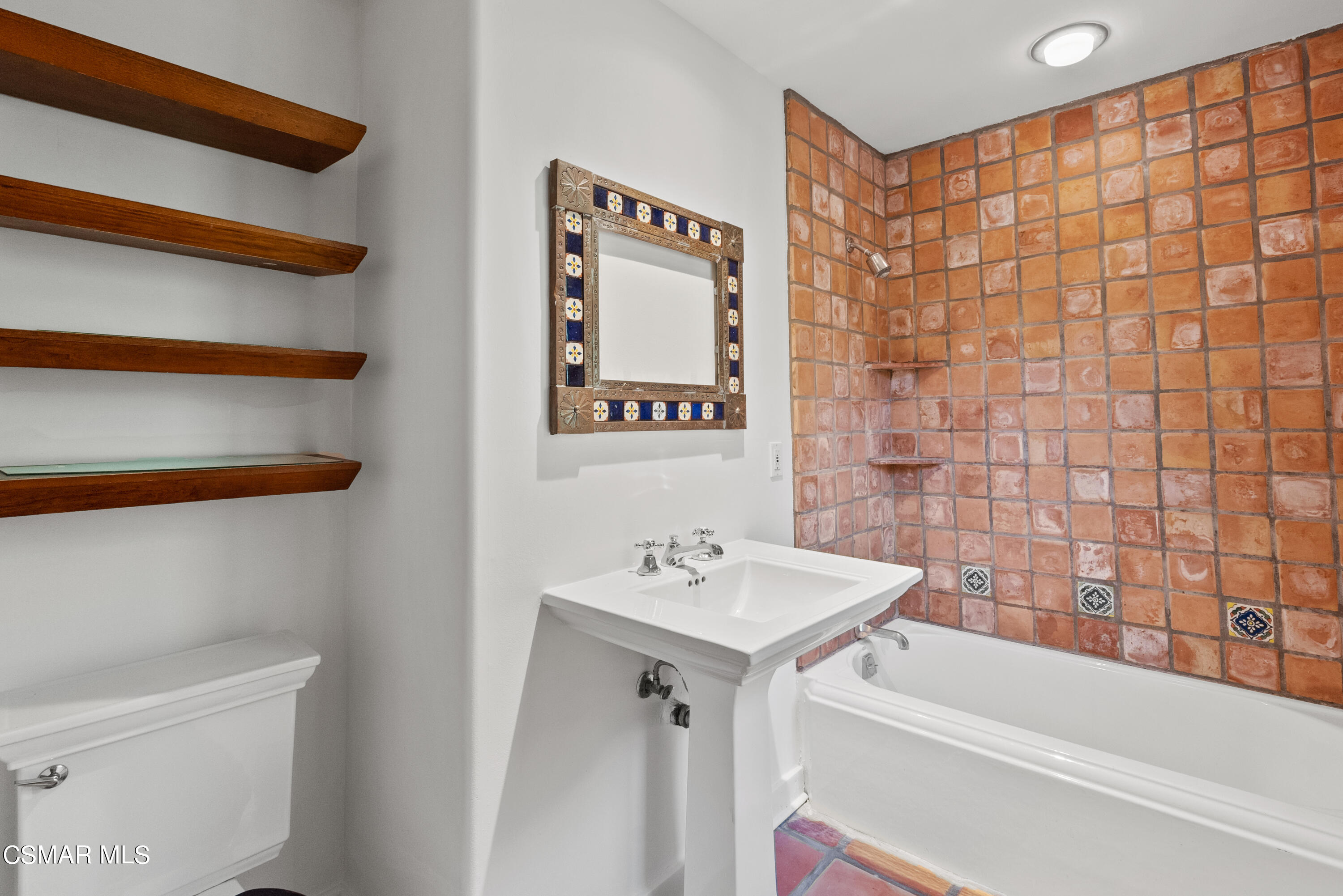 2045 Lookout Drive Agoura Hills, CA 91301 - Photo 24 of 34 a bathroom with a shower and a sink