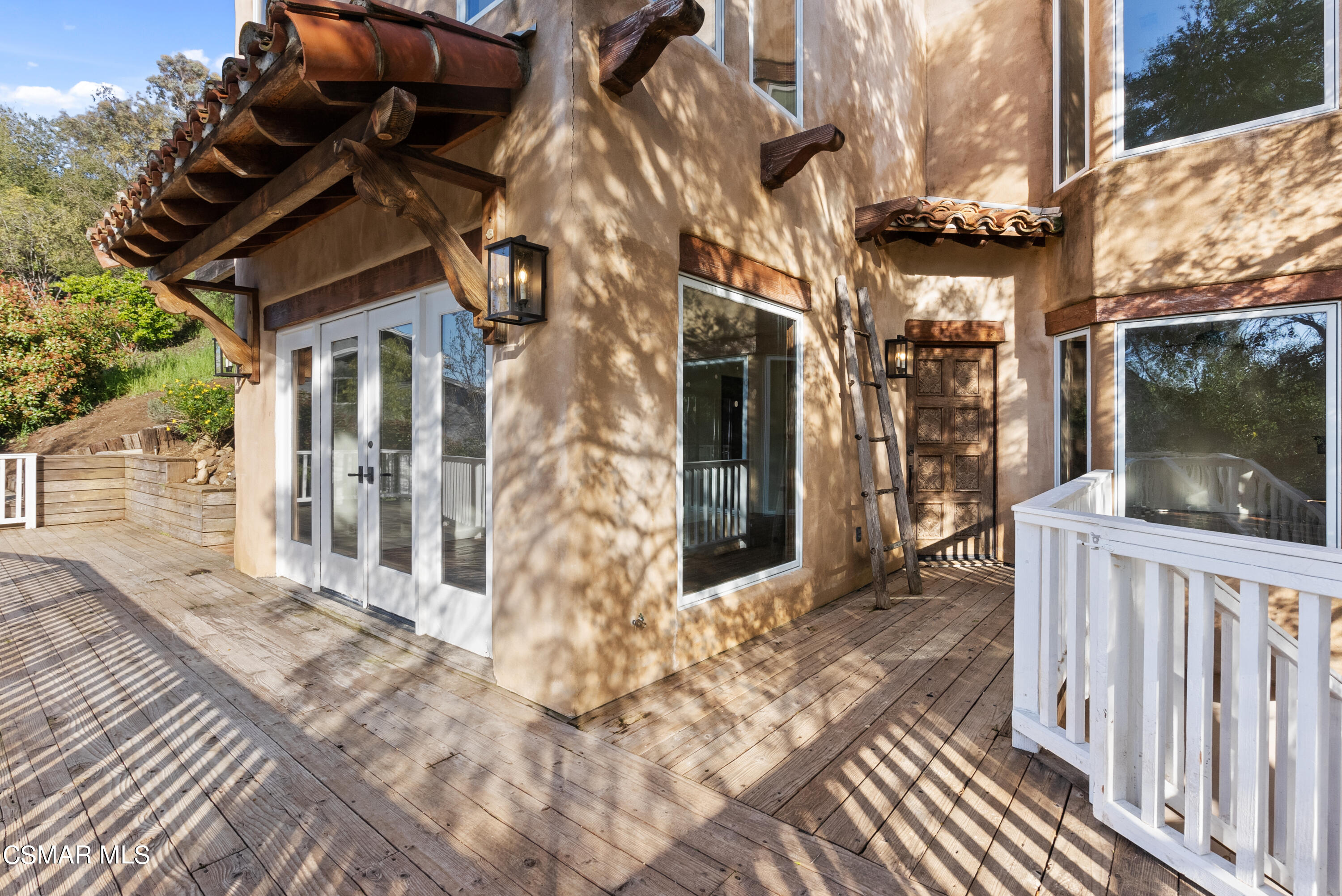 2045 Lookout Drive Agoura Hills, CA 91301 - Photo 28 of 34 a porch with view of living room