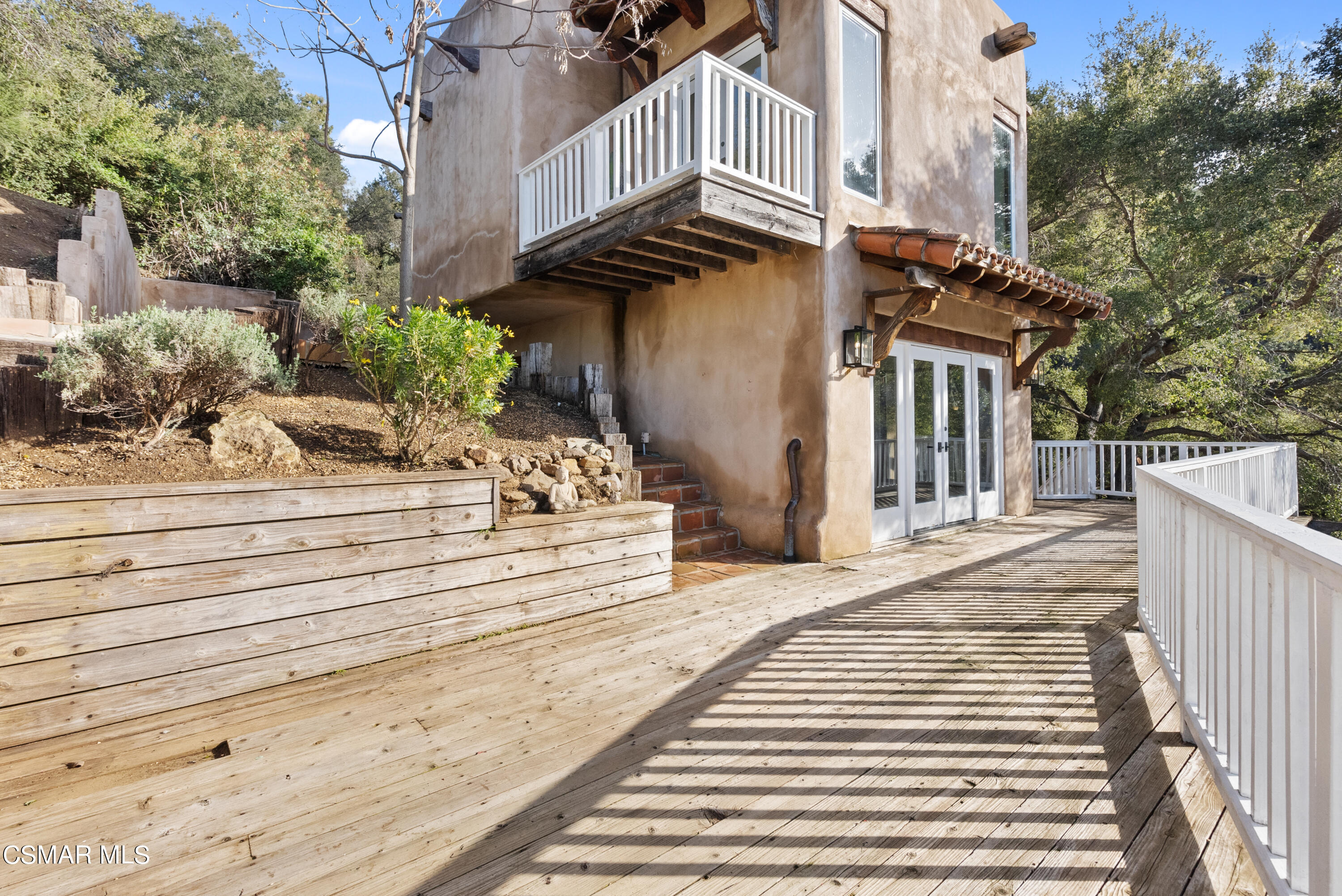 2045 Lookout Drive Agoura Hills, CA 91301 - Photo 29 of 34 a view of a house with a door and a outdoor space