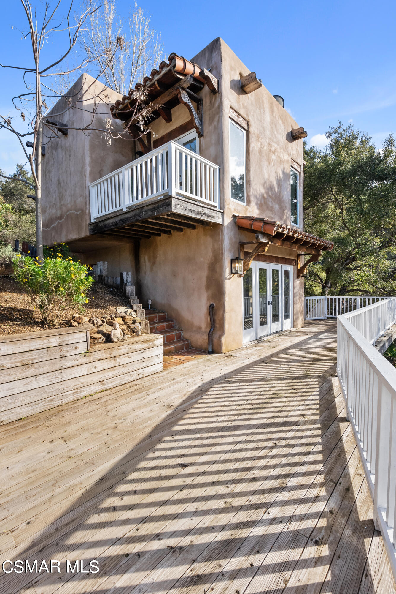 2045 Lookout Drive Agoura Hills, CA 91301 - Photo 30 of 34 a view of a building with a deck