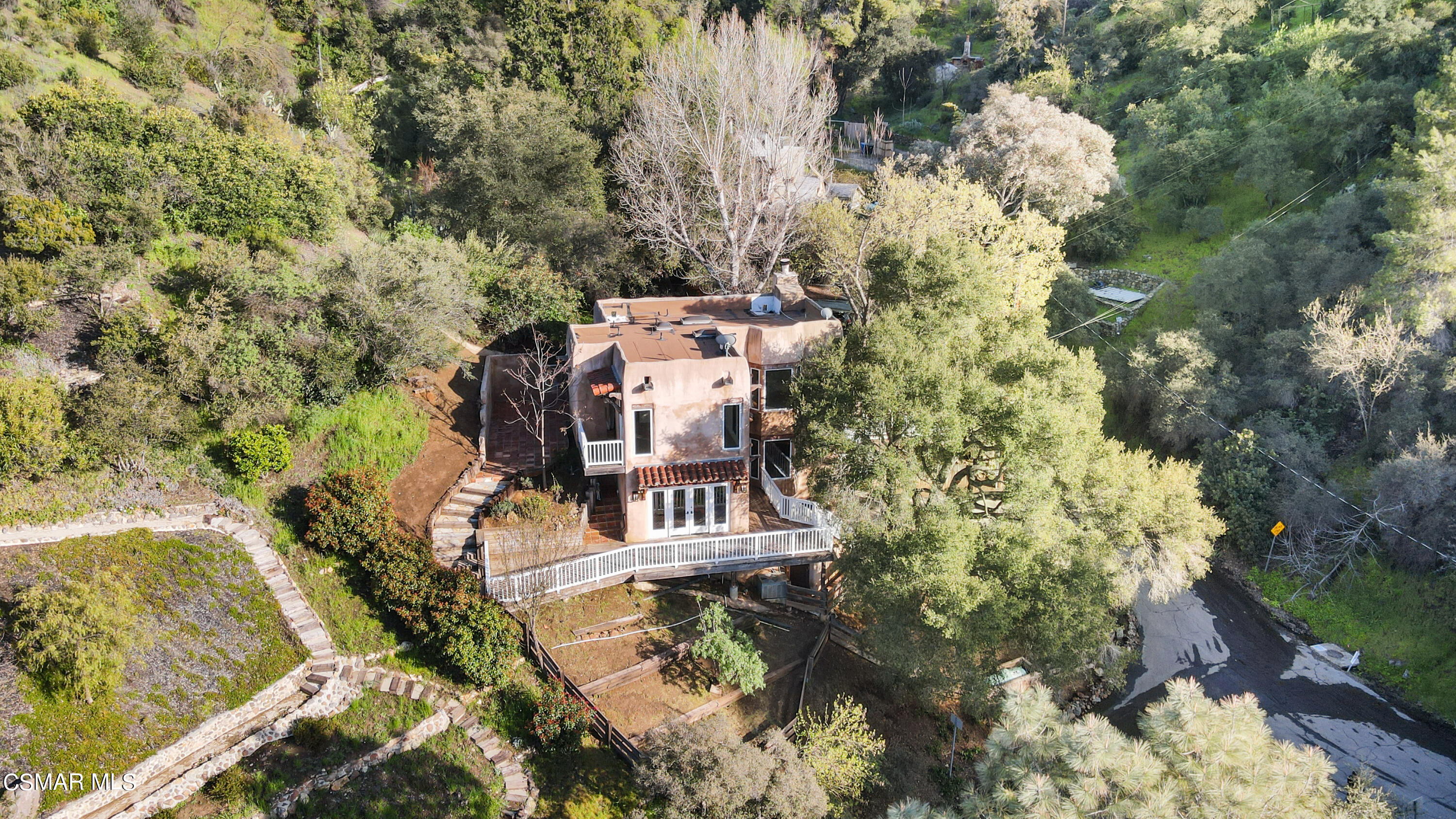2045 Lookout Drive Agoura Hills, CA 91301 - Photo 4 of 34 a view of a house with a yard
