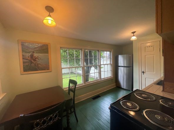 212 West 7th Street Columbus, GA 31901 - Photo 11 of 20 a room with furniture and window