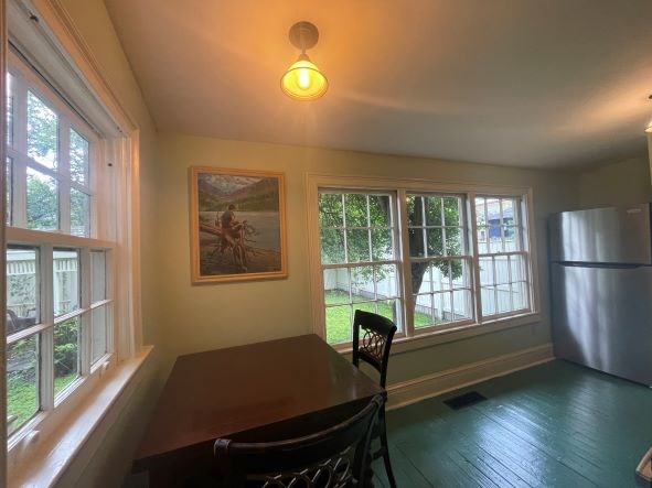212 West 7th Street Columbus, GA 31901 - Photo 12 of 20 a room with furniture and a window