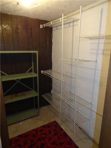2109 Post Road Clarksville, TN 37043 - Photo 17 of 20 Check out the basement closet with shelving