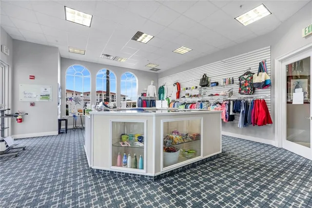 a utility room with stainless steel appliances lots of counter top space