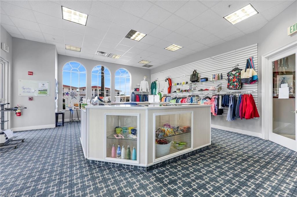 37 High Point Circle East, Unit 109 Naples, FL 34103 - Photo 30 of 37 a utility room with stainless steel appliances lots of counter top space