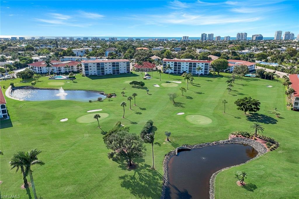 37 High Point Circle East, Unit 109 Naples, FL 34103 - Photo 33 of 37 a view of a city