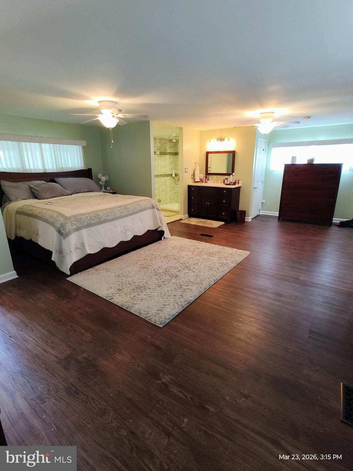 4728 Bucks School House Road Baltimore, MD 21237 - Photo 21 of 64 a bedroom with a bed and dresser with mirror