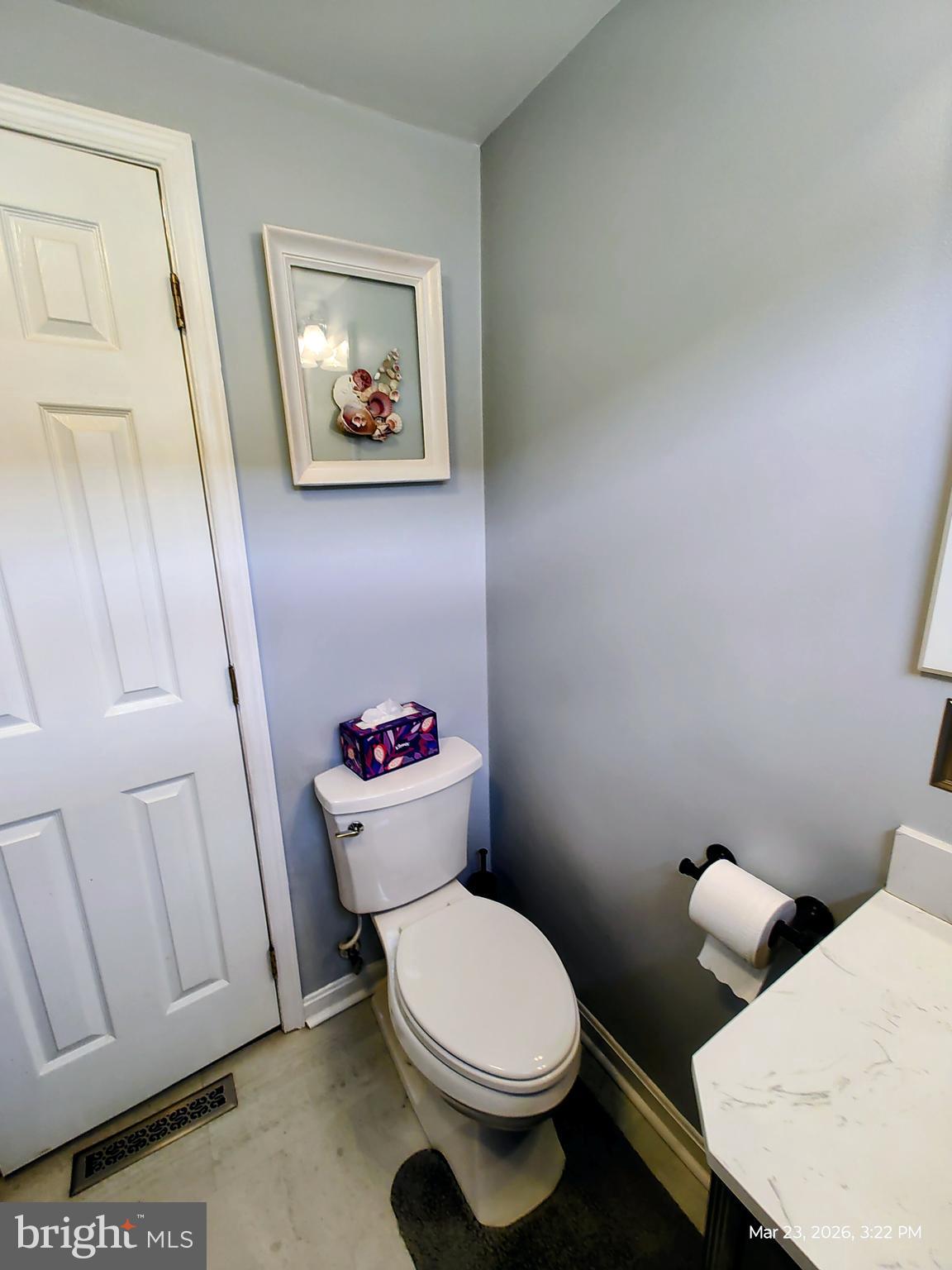 4728 Bucks School House Road Baltimore, MD 21237 - Photo 37 of 64 a white toilet sitting next to a bathroom sink