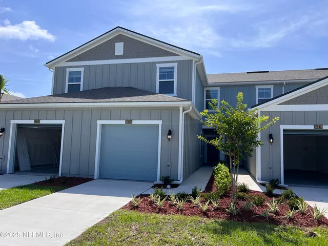 a front view of house with yard
