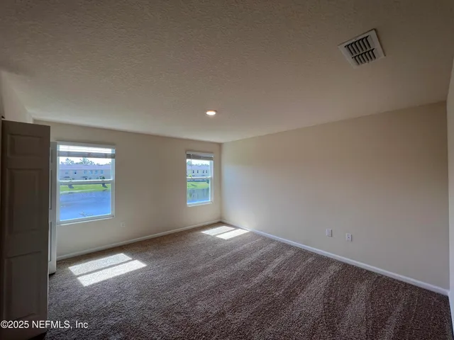a view of empty room with window