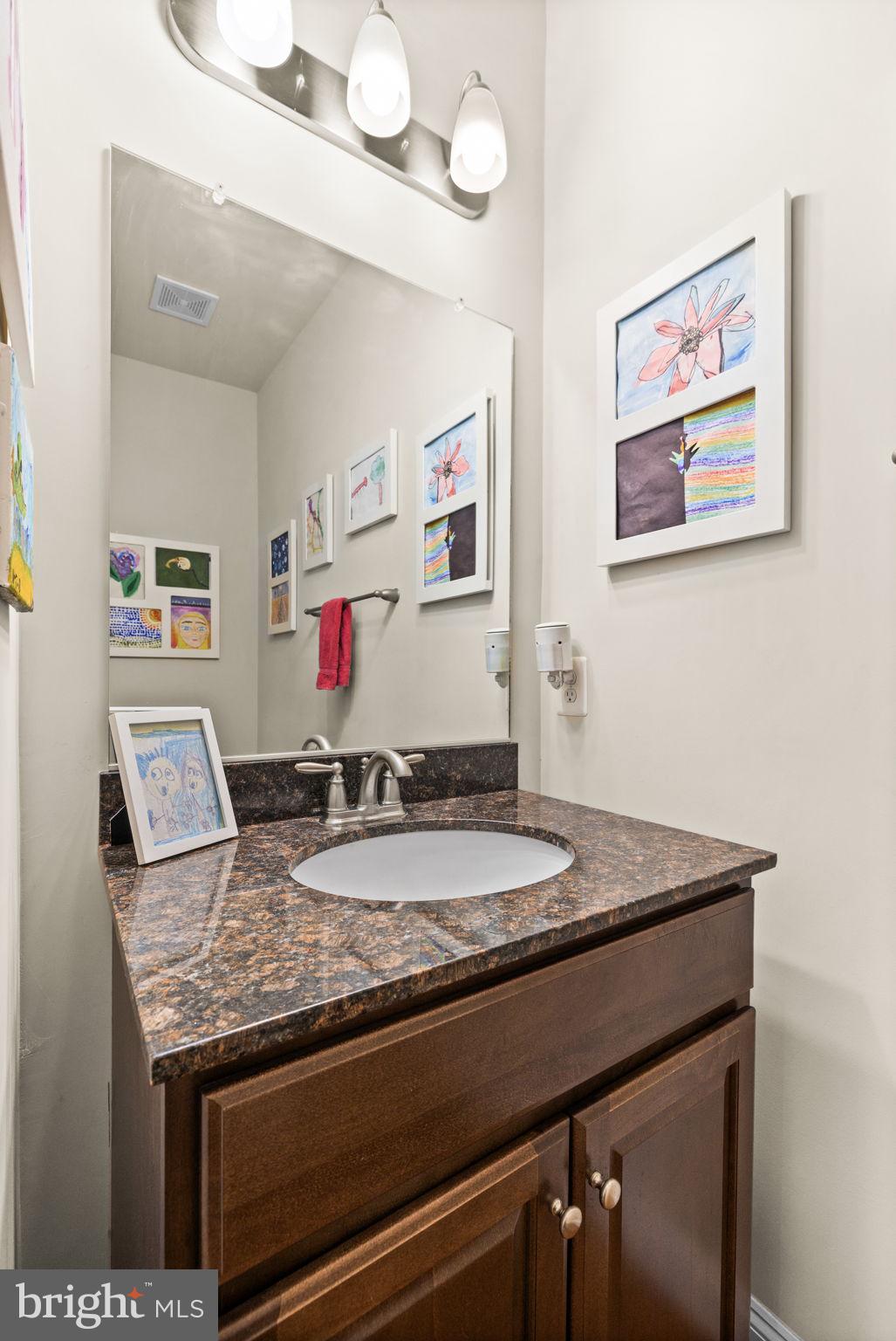 476 Decatur Road Stafford, VA 22554 - Photo 27 of 62 Main level half bathroom with vanity lighting
