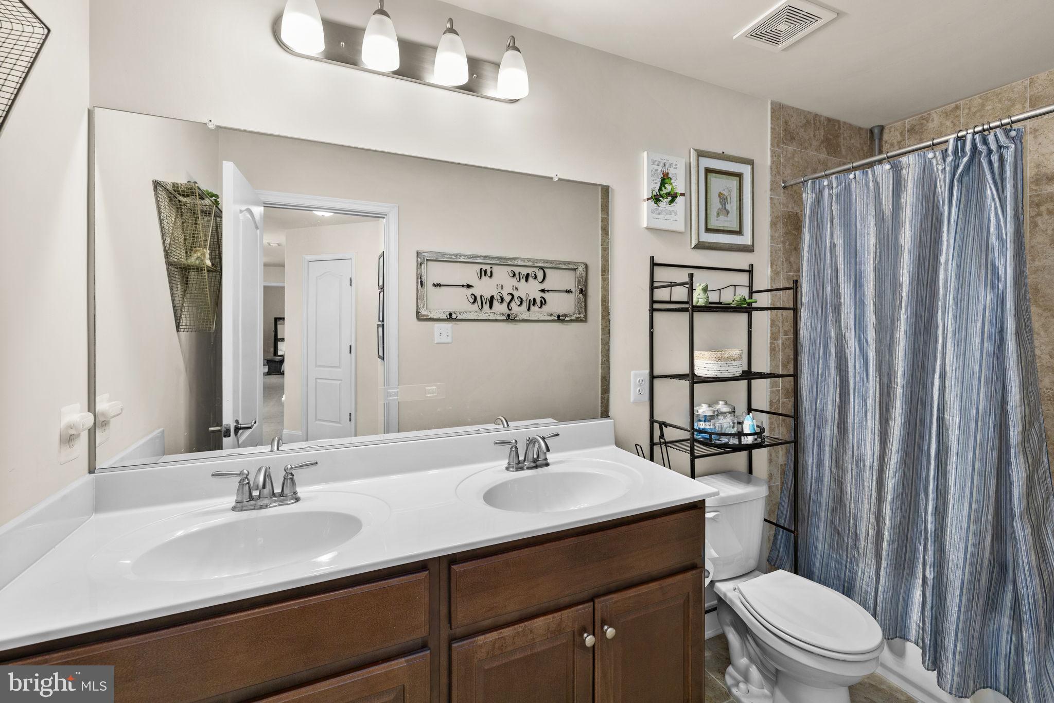 476 Decatur Road Stafford, VA 22554 - Photo 38 of 62 Full bathroom with double sink and tub/shower duo