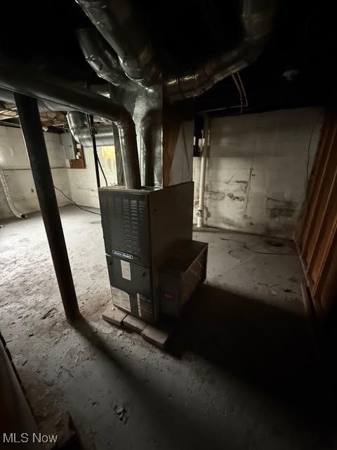 4372 Turney Road Cleveland, OH 44105 - Photo 4 of 16 Unfinished basement with heating unit and electric panel