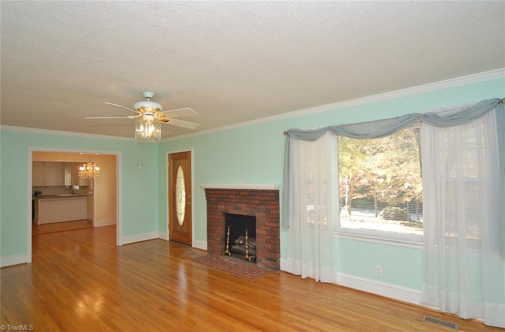 3691 Ebert Road Winston-Salem, NC 27127 - Photo 3 of 30 Spacious living room with gas fireplace and lots of natural light.