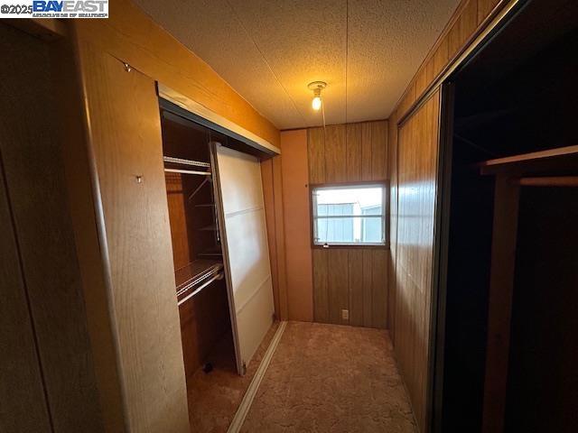 1382 Vía Deste, Unit 61 Livermore, CA 94551 - Photo 12 of 21 a view of hallway with stainless steel appliances wooden floor and a kitchen view