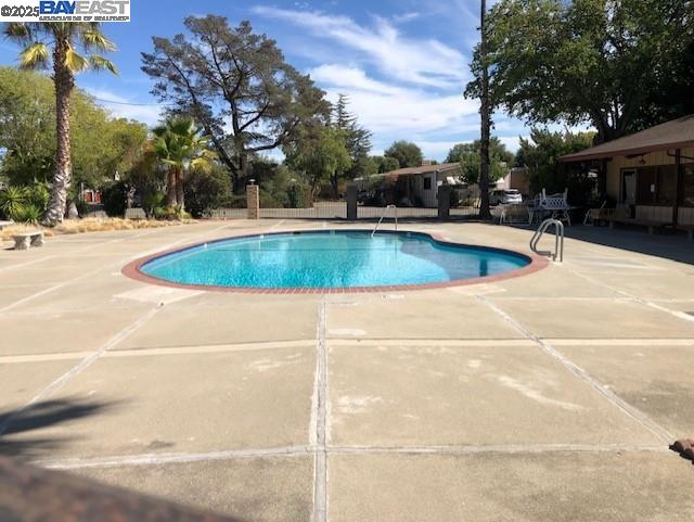 1382 Vía Deste, Unit 61 Livermore, CA 94551 - Photo 19 of 21 a view of outdoor space and swimming pool