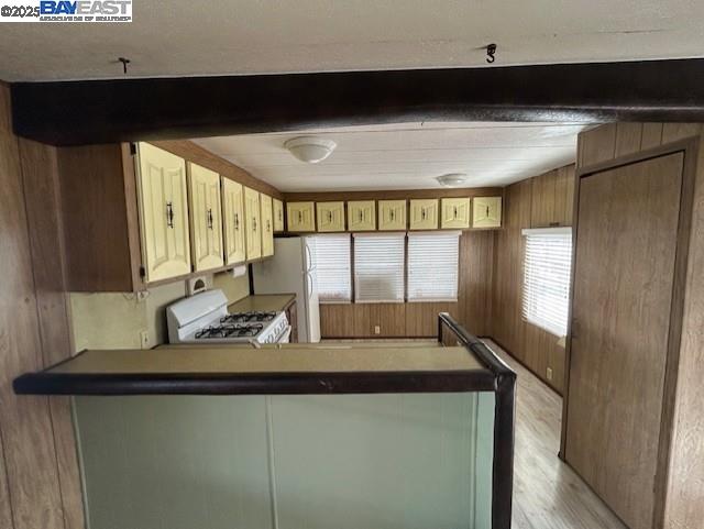 1382 Vía Deste, Unit 61 Livermore, CA 94551 - Photo 3 of 21 a kitchen with stainless steel appliances a sink and a refrigerator