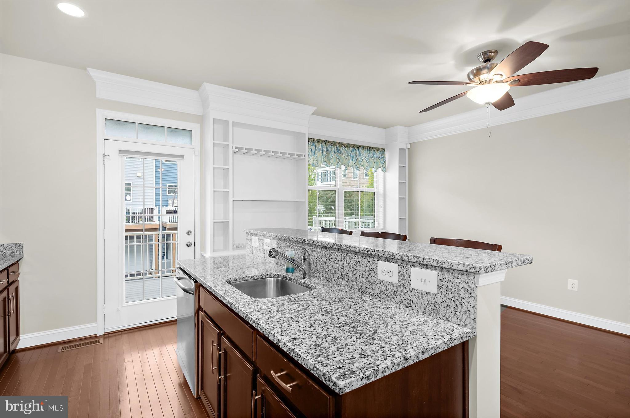 614 South Cherry Grove Avenue Annapolis, MD 21401 - Photo 11 of 40 a kitchen with a sink a counter space and a window