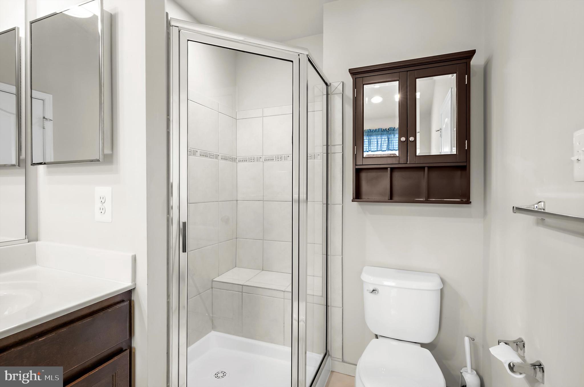 614 South Cherry Grove Avenue Annapolis, MD 21401 - Photo 19 of 40 a bathroom with a toilet sink and shower