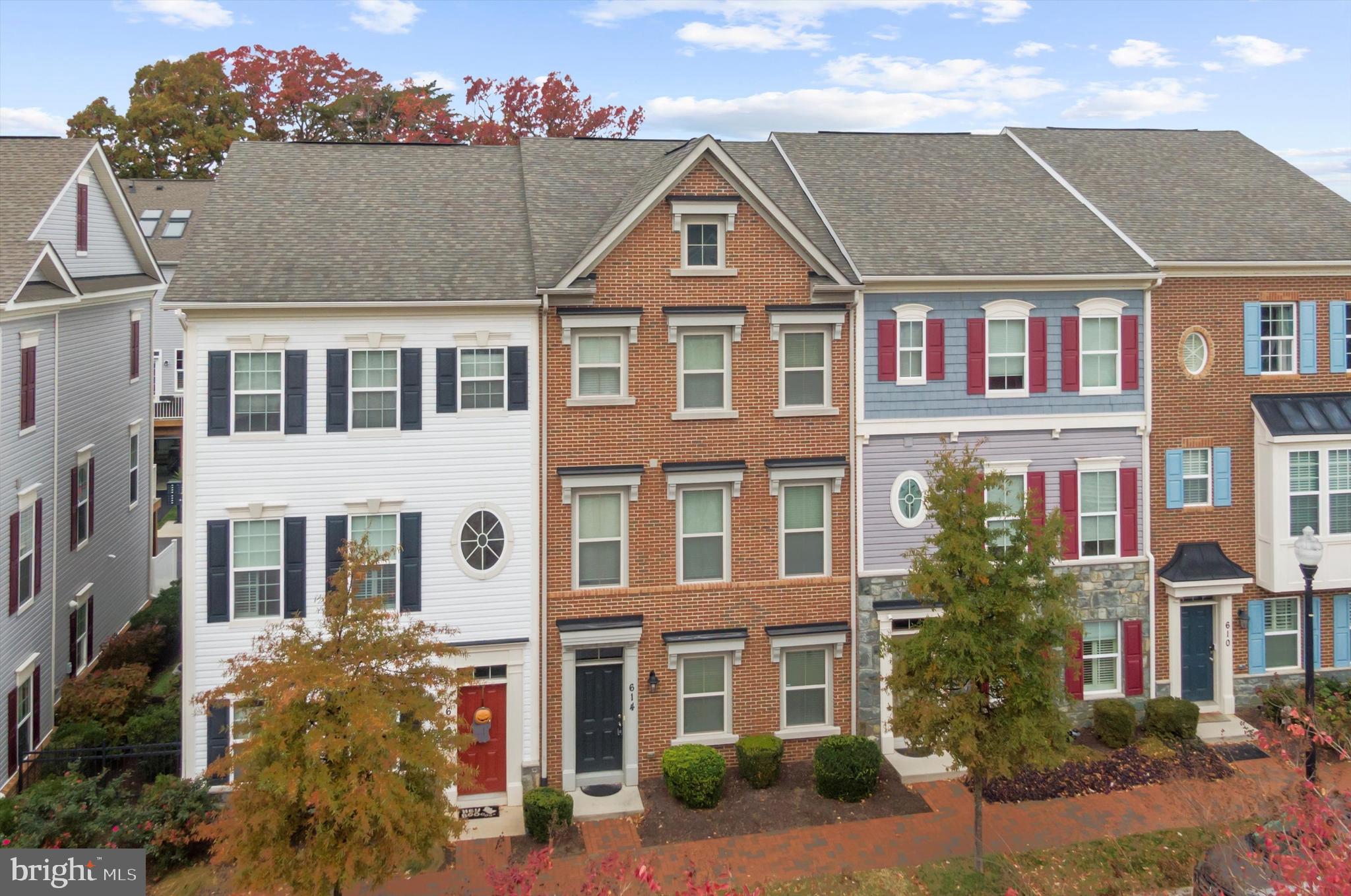 614 South Cherry Grove Avenue Annapolis, MD 21401 - Photo 2 of 40 a front view of a residential apartment building with a yard