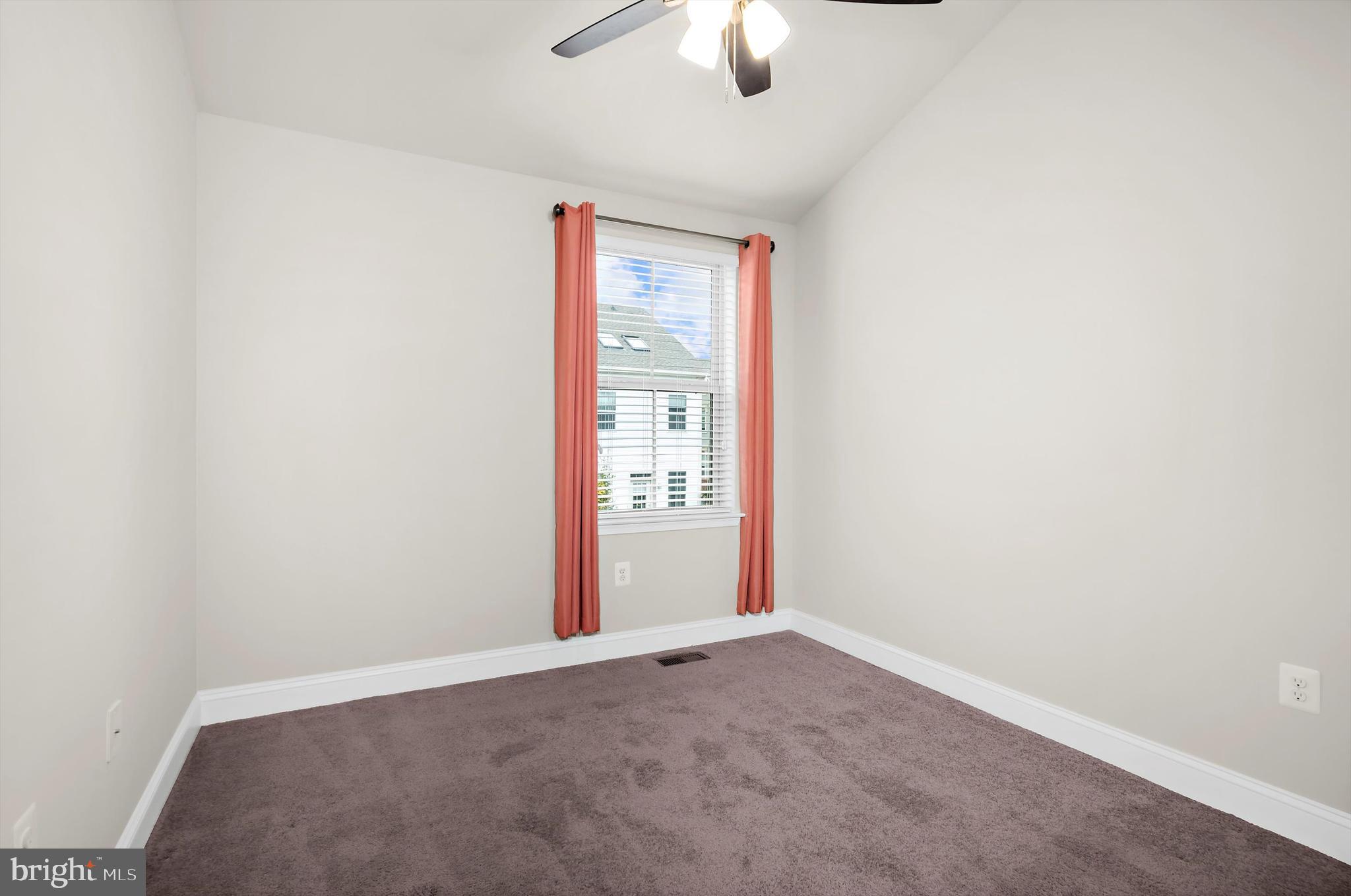 614 South Cherry Grove Avenue Annapolis, MD 21401 - Photo 22 of 40 an empty room with a window and a fan