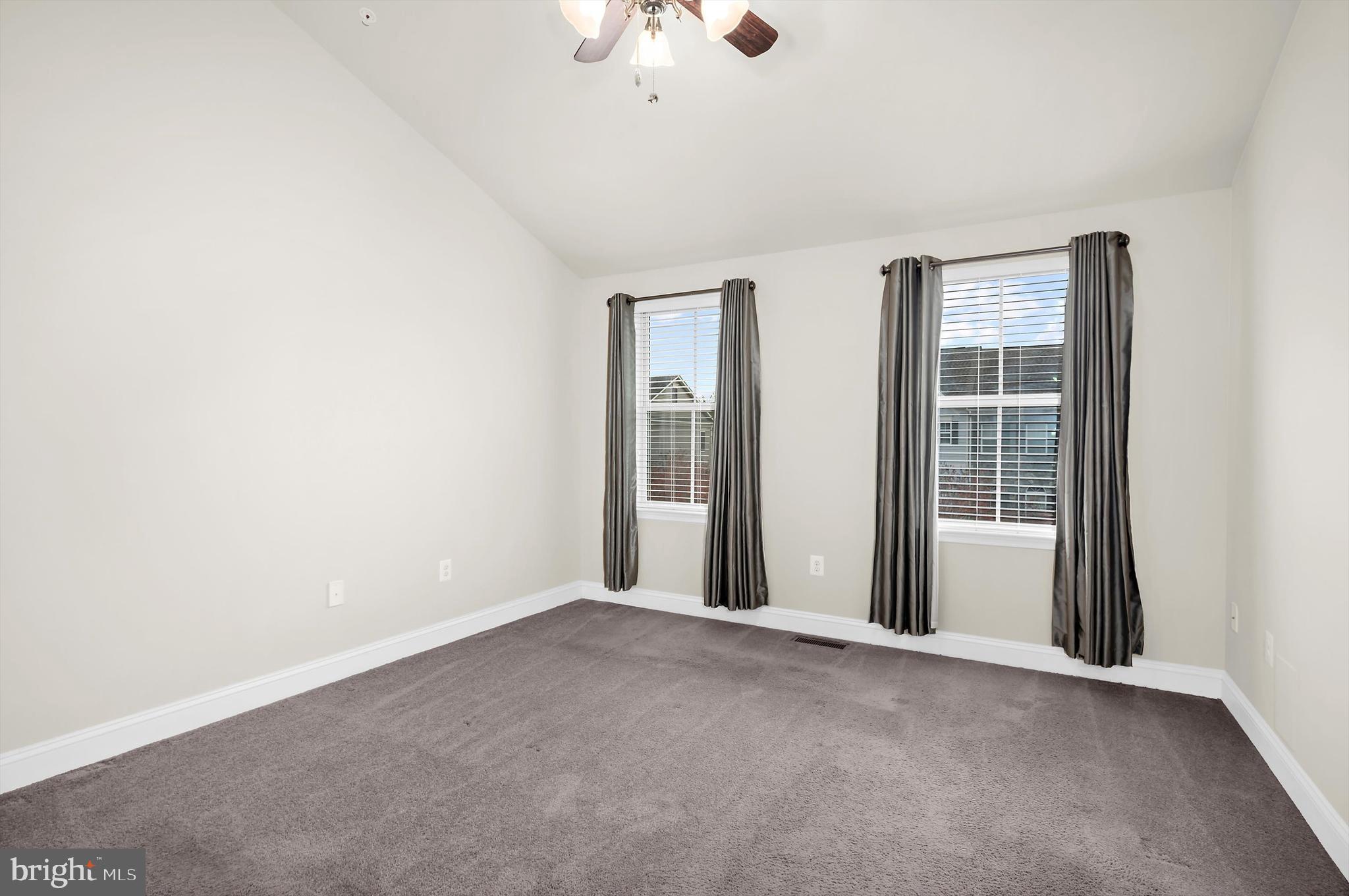 614 South Cherry Grove Avenue Annapolis, MD 21401 - Photo 26 of 40 an empty room with chandelier fan