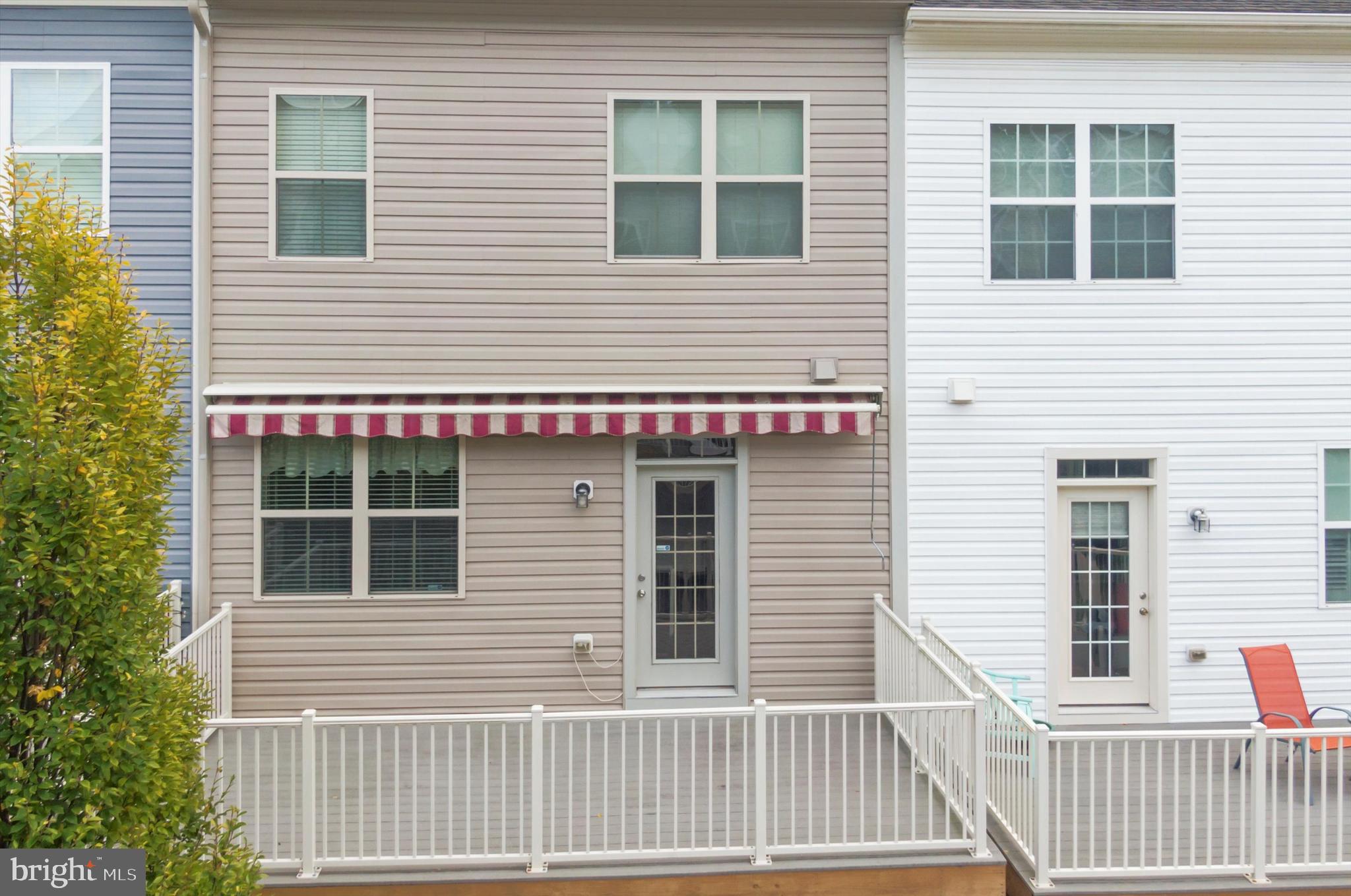 614 South Cherry Grove Avenue Annapolis, MD 21401 - Photo 35 of 40 a view of a house with deck and wooden fence