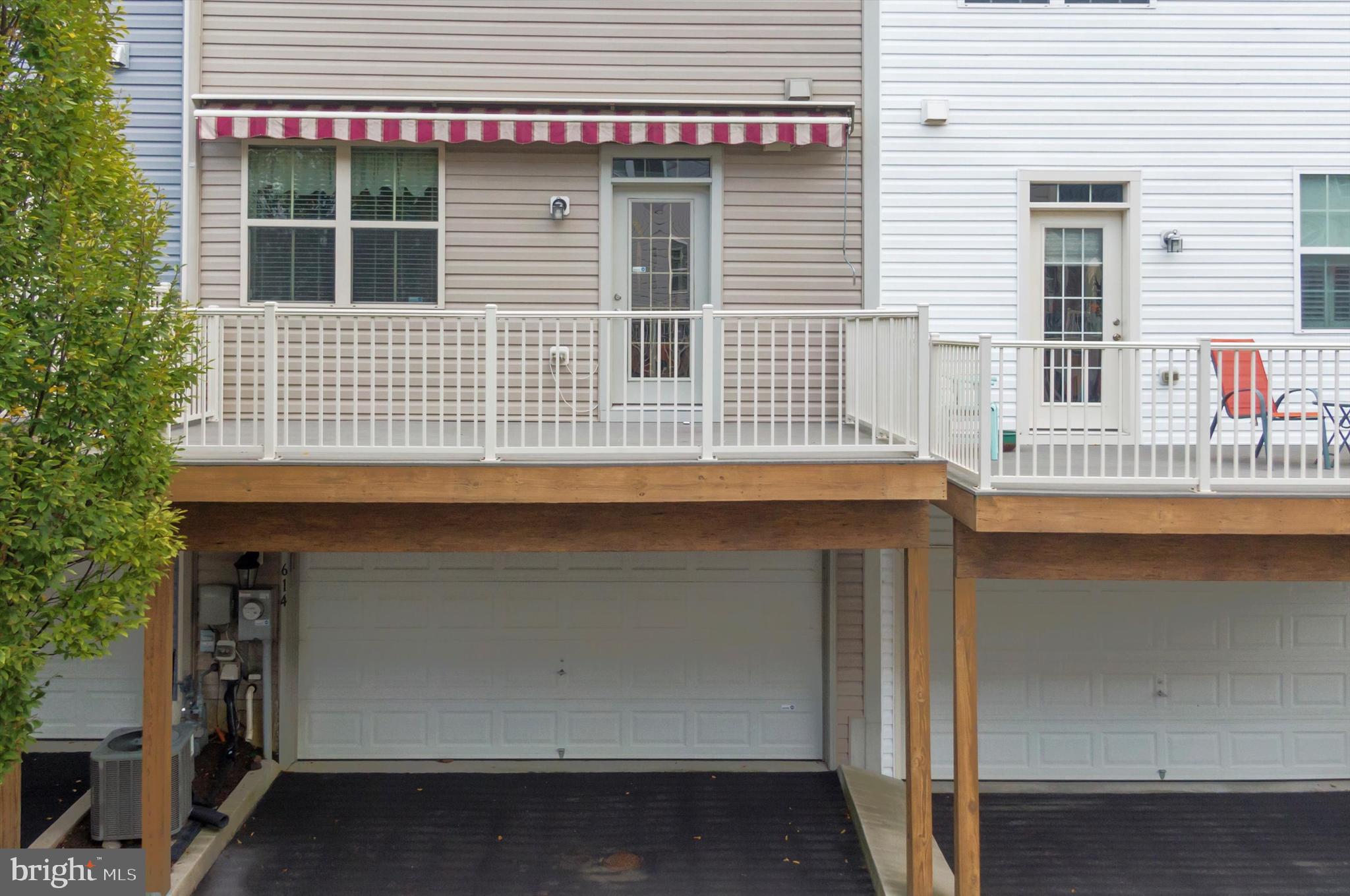 614 South Cherry Grove Avenue Annapolis, MD 21401 - Photo 36 of 40 a front view of a house with a garage
