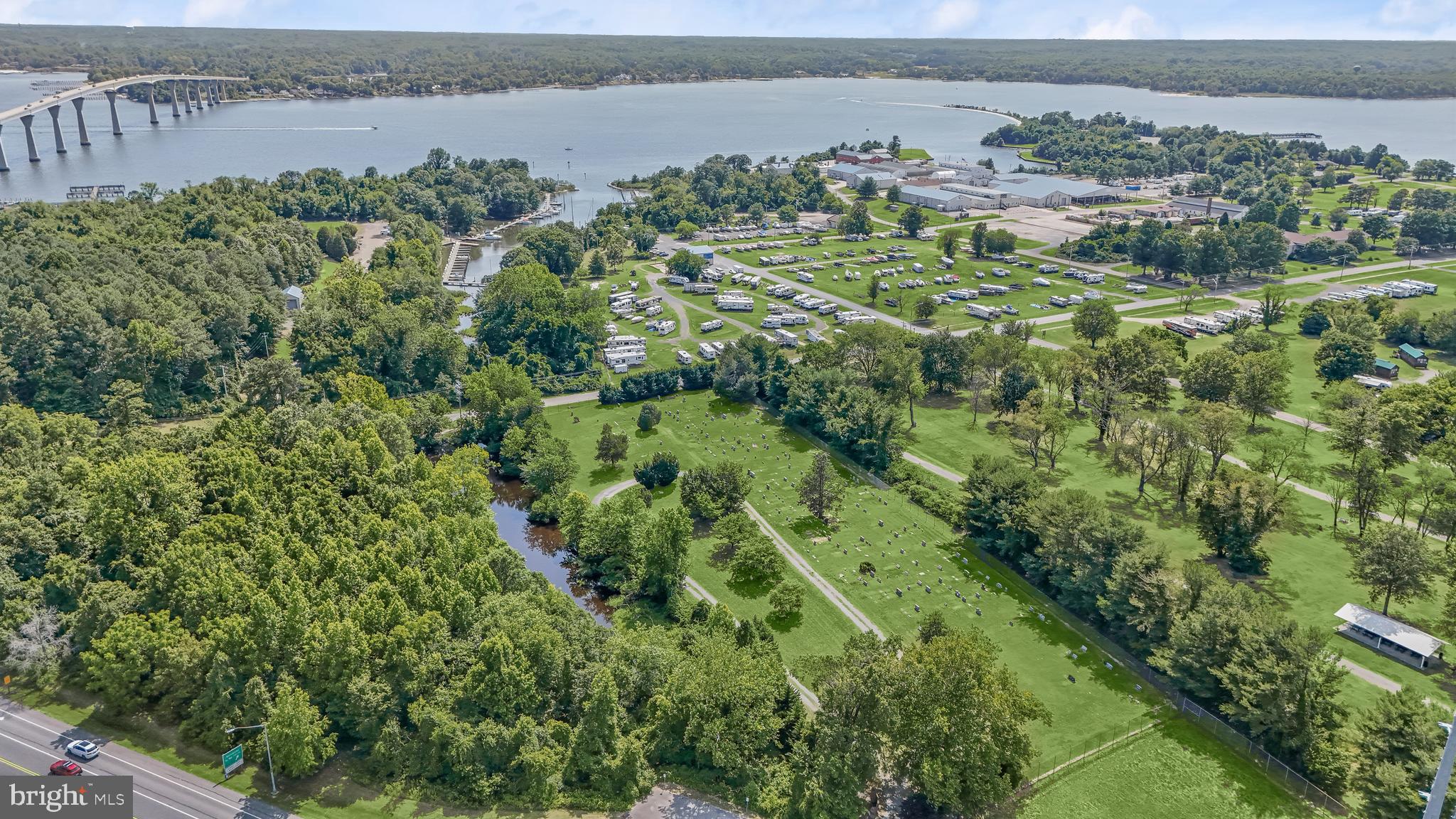 14055 Solomons Island Road South Solomons, MD 20688 - Photo 11 of 17 a view of a lake with a mountain in the back